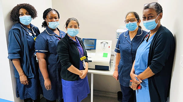 The team from the Royal London Hospital with the AQT90 FLEX immunoassay analyzer